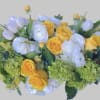 This lush arrangement has yellow roses, yellow spray roses, green hydrangeas, Billy