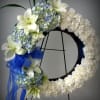 Stylish and elegant, this is a beautiful floral arrangement for service or