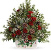 Beautifully arranged in a pretty-meets-practical stoneware serving dish, this festive, tree-inspired arrangement