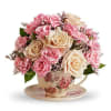 Send comfort to the recently bereaved with this sweet sympathy flower arrangement.