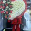 Bleeding hearts with roses and ribbons gets a message 