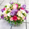 Assorted spring mixed flowers arranged in a box
(flowers and colors may vary)