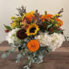 Hydrangea, sunflowers, marigolds, orange alstromeria sure to brighten anyone&rsquo;s day!