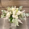 Mixed white flowers with lush greenery, includes hydrangea, roses, gerbera daisies and
