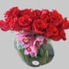 A charming bouquet of a fresh and fragrant red roses, adorned with