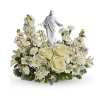 An elegant display of faith and grace, this beautiful arrangement will comfort