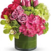 Upscale and uptown. This fantastic arrangement is a beauty and a half