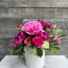 Hot pink and green with light pinks in minimal touches to complete