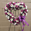 15 purple roses,5 stems of purple cushion, 5 stems of white daisies