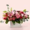 Timeless blooms and classic Valentine shades create the Head Over Heels Bouquet.