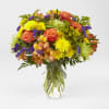 Flowers of yellow and green, and pops of orange and purple. Full