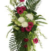 Convey your respect and admiration with this spray of striking red and