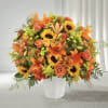 Autumn colors composed of sunflowers, lilies, and roses by FTD