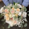 Bridal Bouquet with roses, lisianthus, stock, baby&#039;s breath.