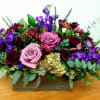 A garden assortment of lavender and purple including stock, roses, alstroemeria, hydrangea