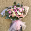 Beautiful pink and white arrangment featuring peonies (seasonal), white and pink roses