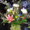 Asiatic Lilies, Delphiniums, Alstro, White mums, Eucalyptus and more
