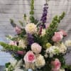 A simple and elegant pastel arrangement that offers peace and tranquility to