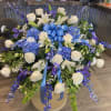 A beautiful mix of playa white roses and Lillie&rsquo;s blue hydrangeas and