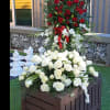 Your choice of casket spray and standing spray. A custom design or