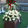 Your choice of casket spray and standing spray. A custom design or