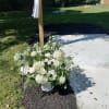 Beautiful all white roses, daisies, carnations and other flowers  pew side
