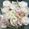 Beautiful blooming flower box full of fresh flowers in a white and
