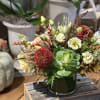 Our October signature design is glowing with Fall blooms!  Candlelight roses