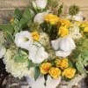 This royal arrangement consisting of Lisianthus, Spray Roses, Hydrangeas, Snow on the