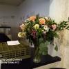 Beautiful festive bar side vase arrangement creates atmosphere of celabration  