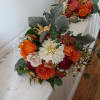 Beautiful fall colors dahlia, roses, alstroemeria and other flowers round posy bridesmaids