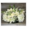 All white premium flowers. Beautifully arranged round in a modern glass cube.