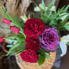 Delightful Assortment of Seasonal Blooms Highlighted with Evergreens in a Keepsake Corrugated