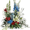 Proud and patriotic, this boldly designed red, white and blue bouquet displays