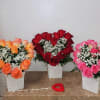 IF you choose this arrangement, it has 14 roses including a vase
