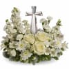 An elegant display of faith and divine peace, this beautiful arrangement will