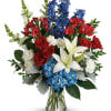 Perfectly patriotic with its red, white and blue blooms, this bold bouquet