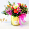 This pretty arrangement is classically elegant and delivered in gold or glass