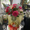 The perfect mixture of roses and delicate white and pink carnations. The
