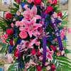 This vibrant standing spray shares the warmth and comfort your loved ones