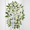 The Exquisite Tribute Standing Spray is an elegant display of sweet serenity.