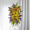 Our Thoughtful Prayers Standing Spray beautifully remembers their passion and radiance within