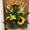 Shabby pumpkin filled with fall blooms