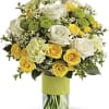 This beautiful  bouquet includes white roses, yellow spray roses, green carnations