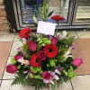 The Tropical arrangement make with bird of paradise ,  ginger, roses