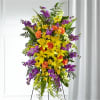 Our Thoughtful Prayers Standing Spray beautifully remembers their passion and radiance within