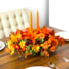 Graciously gather your family around the warm glow and classic autumn colors