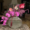 Elegant arrangements with orchids and whimsical tropical flowers. Our designer will create