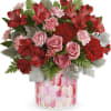 A precious bouquet containing Red Hot Alstro, Red Carnations, Pink roses and