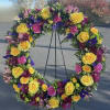 Beautiful 22" Open Wreath filled with a beautiful garden variety of flowers